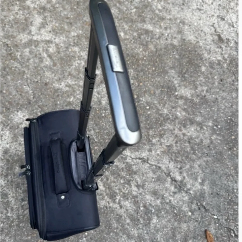 Travelpro Black Soft-Shell Rolling Under-seat Carry-On with Front Pocket